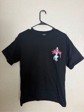 Stussy Black Tee with Pink Logo and Bust Graphic